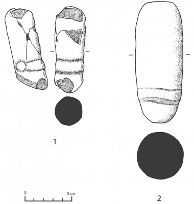 Figure 4. 1) Zoomorphic basaltic pestle (RN 140049); 2) phalliform basaltic pestle (RN140053).